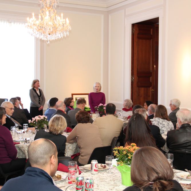 Paula Manganelli addresses former and current Meridian Program Officers who gathered in honor of her retirement.