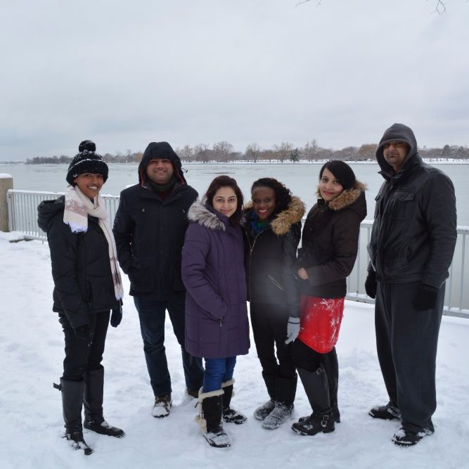 Fellows having fun after snowstorm at Southwest Waterfront.