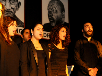 Cast members from Fabrica performing songs from Les Miserables at Busboys and Poets.