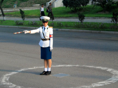 The famous Traffic Ladies of Pyongyang. There are no stop light in the city, but then again, there is not much traffic either.