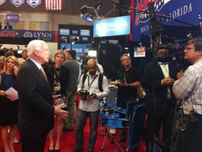 Mustafa in 2012 listening to Senator McCain following the the second presidential debate in Boca Raton, FL.