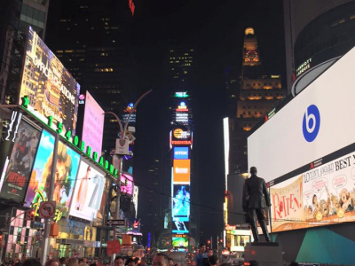 Students roam around at the Times Square.