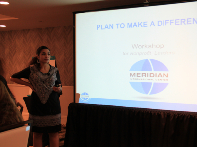 Atlas Corps Fellow Safa Hajjaj moderates a session on action planning.