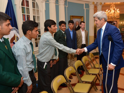 U.S. Secretary of State John Kerry greets students from Pakistan's Army Public School and Degree College in Peshawar, at the U.S. Department of State in Washington, D.C.