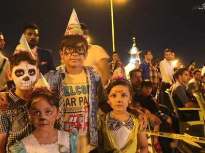 Children with painted faces at Basra City of Peace Festival