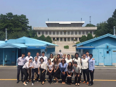 Korean and American Participants at the DMZ. North Korea is visible in the backgorund.