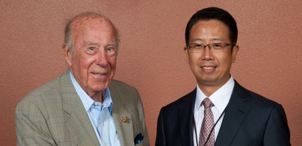 Former U.S. Secretary of State George Shultz with group leader, Mr. Luhao Min