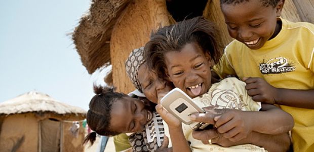 Children in Africa enjoy the benefits of the mobile phone. Source: Project Futures