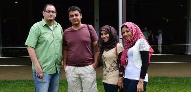 Zainab Jassim (center right) and fellow IYLEP students with UMass staff member, Mohammed Elghoul