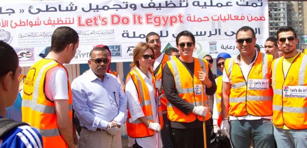 Al-Amir Mohssen, second from left, leads volunteers in a clean up day as part of Let's Do It Egypt.