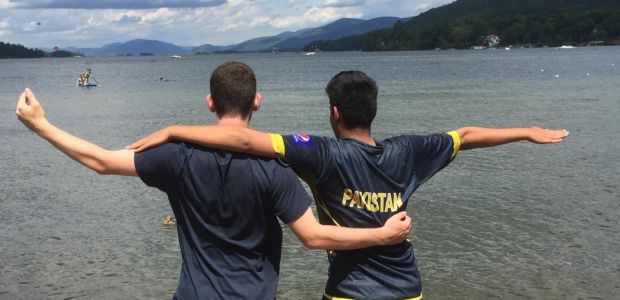 Two U.S.– Pakistan Global Leadership and STEM participants take in the view during a break at Lake George in Upstate, New York.