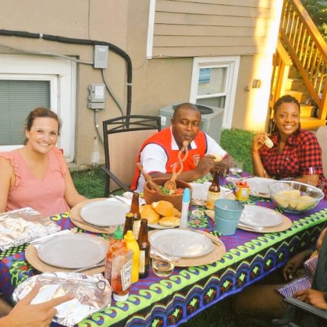 IVLP Participant from Cameroon shares a picture with his home hospitality hosts in Washington, DC