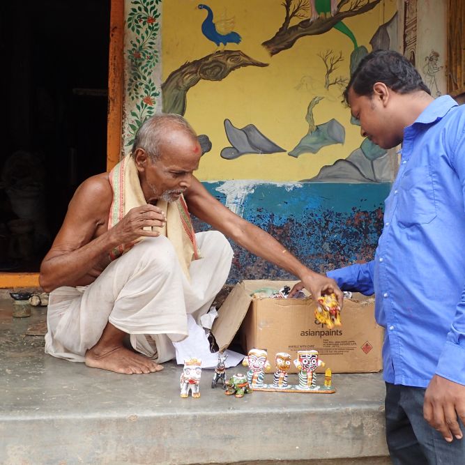 Visiting a talented craftsman in Raghurajpur in Odisha's Puri District.