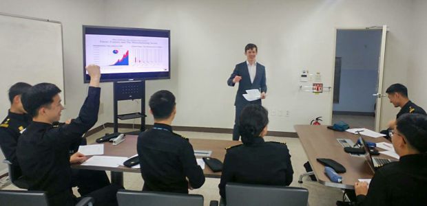 Jason Cox, a participant in the 2011 U.S. Congress - Republic of Korea National Assembly Exchange Program pictured here teaching at the Korean Naval Academy
