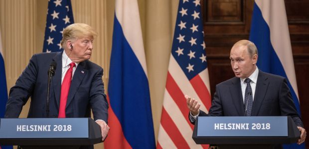 President Trump and Russian President Vladimir Putin answer questions during a joint news conference after their summit on July 16 in Helsinki. Photo: Chris McGrath/Getty Images