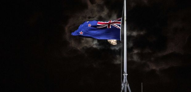 The national flag was flown at half-staff on Friday outside the Parliament building in Wellington.CreditMarty Melville/Agence France-Presse — Getty Images
