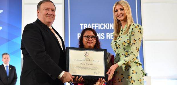 U.S. Secretary of State Mike Pompeo, joined by Advisor to the President Ivanka Trump, presents a certificate to 2018 'TIP Report Hero' Sunita Danuwar of Nepal.  (Photo Credit: U.S. Department of State)