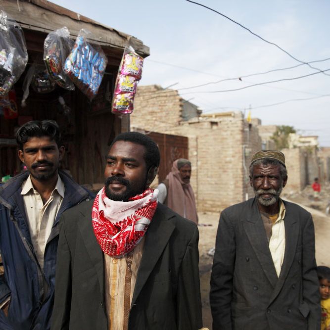 A group of Sheedi men in Hyderabad, Pakistan. Photo credits to Luke Duggleby/The Sidhi Project