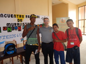 Andrew Veveiros of the U.S. Embassy with some of the painters from nearby islands. 