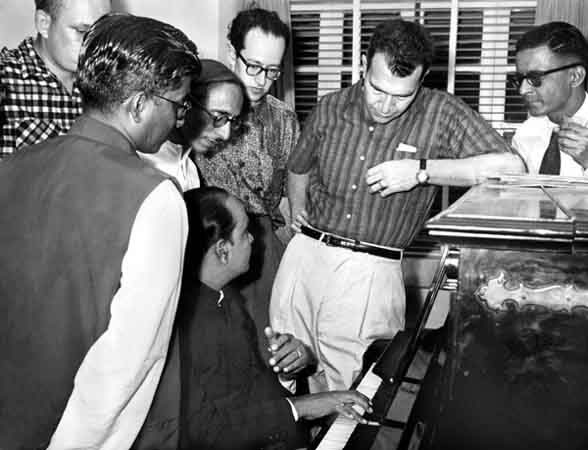  Dave Brubeck and Paul Desmond (center) encounter Indian musicians. Bombay, India, 1958. Courtesy of the Brubeck Collection, Holt-Atherton Special Collections, University of the Pacific Library. Copyright Dave Brubeck.