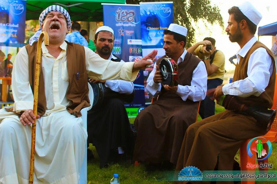 Community members singing at the  Baghdad City of Peace Festival.