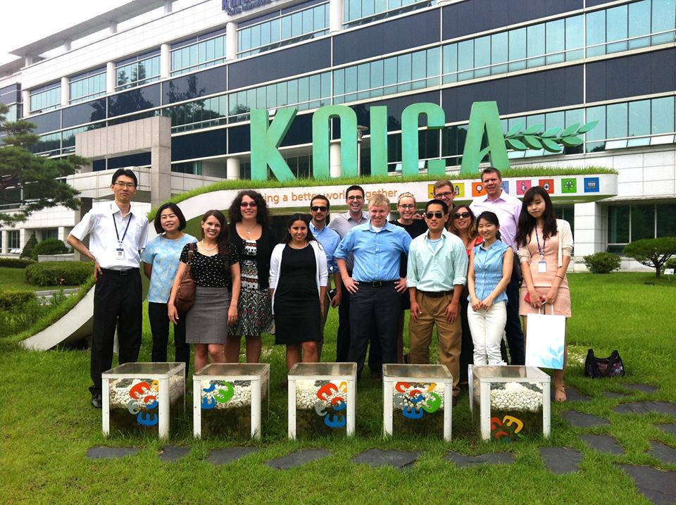 Joseph pictured on first on the right in the back row along with the other members of the U.S. delegation after visiting the Korean International Cooperation Agency - KOICA.
